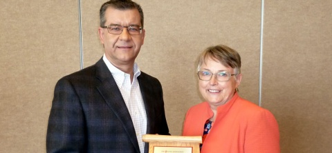 Dr. Darcy Marciniuk (left) receives the 2016 Lifetime Achievement Award from Ms. Pat Smith, Chair of the Lung Association.